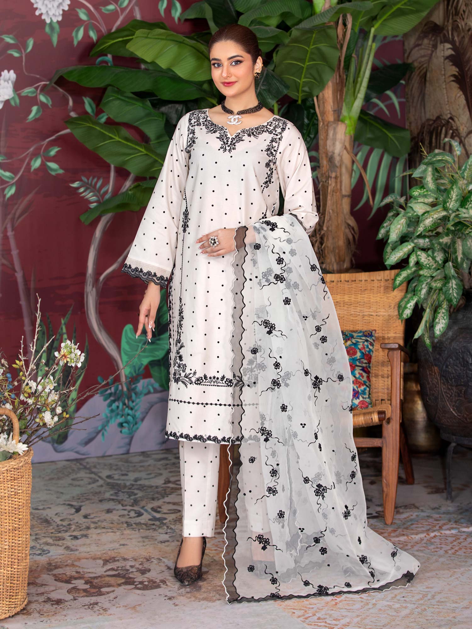 Heera's White & Black Embroidered Winter Linen Suit