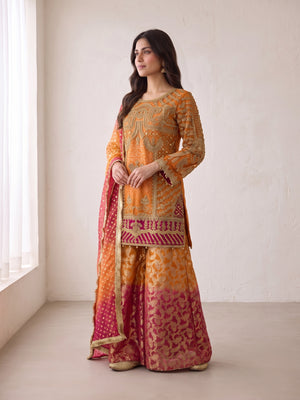 Orange embroidered net suit with sharara - angled view