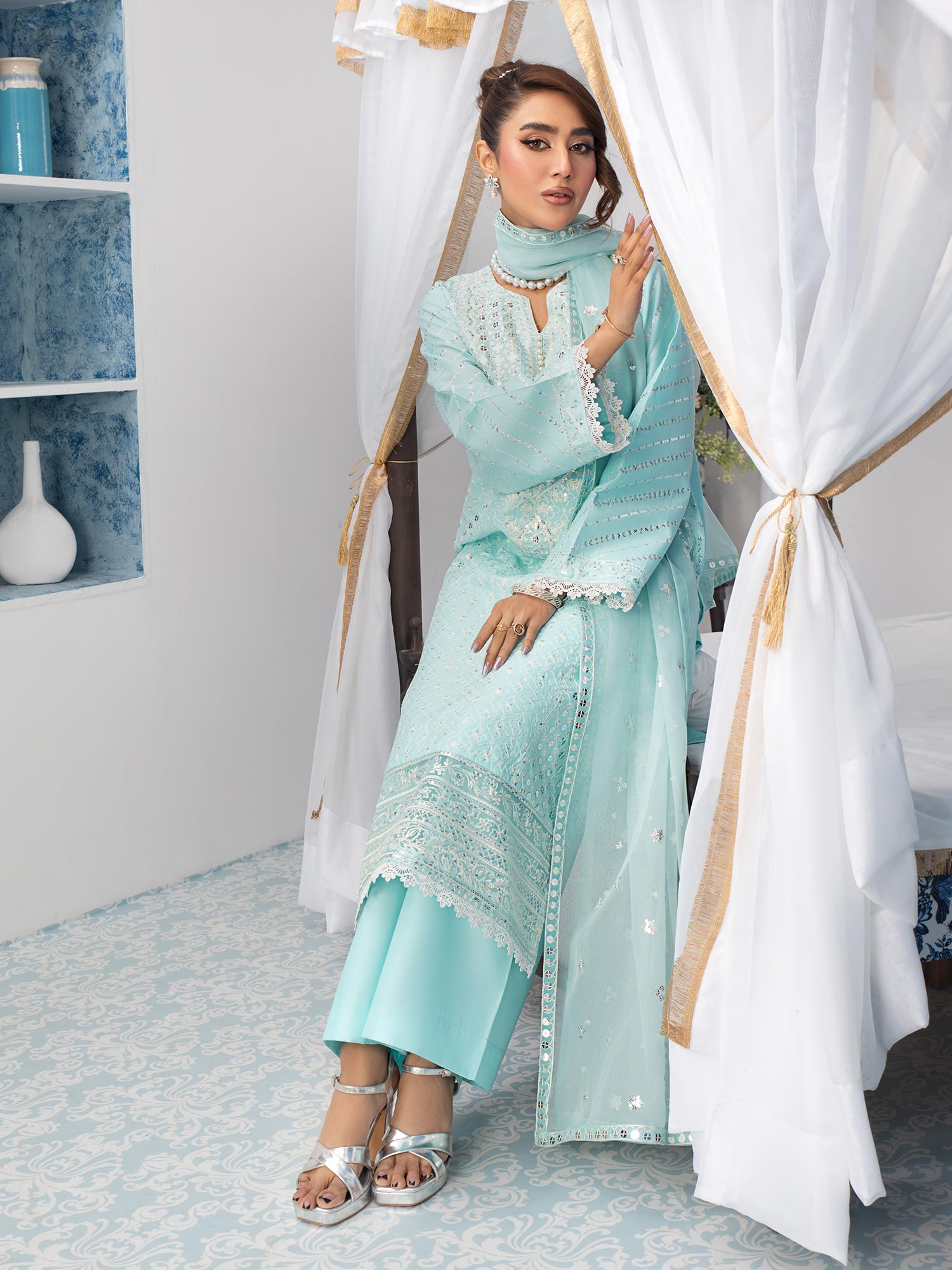 Heera's Aqua Blue Embroidered Cambric Cotton 3-Piece Suit