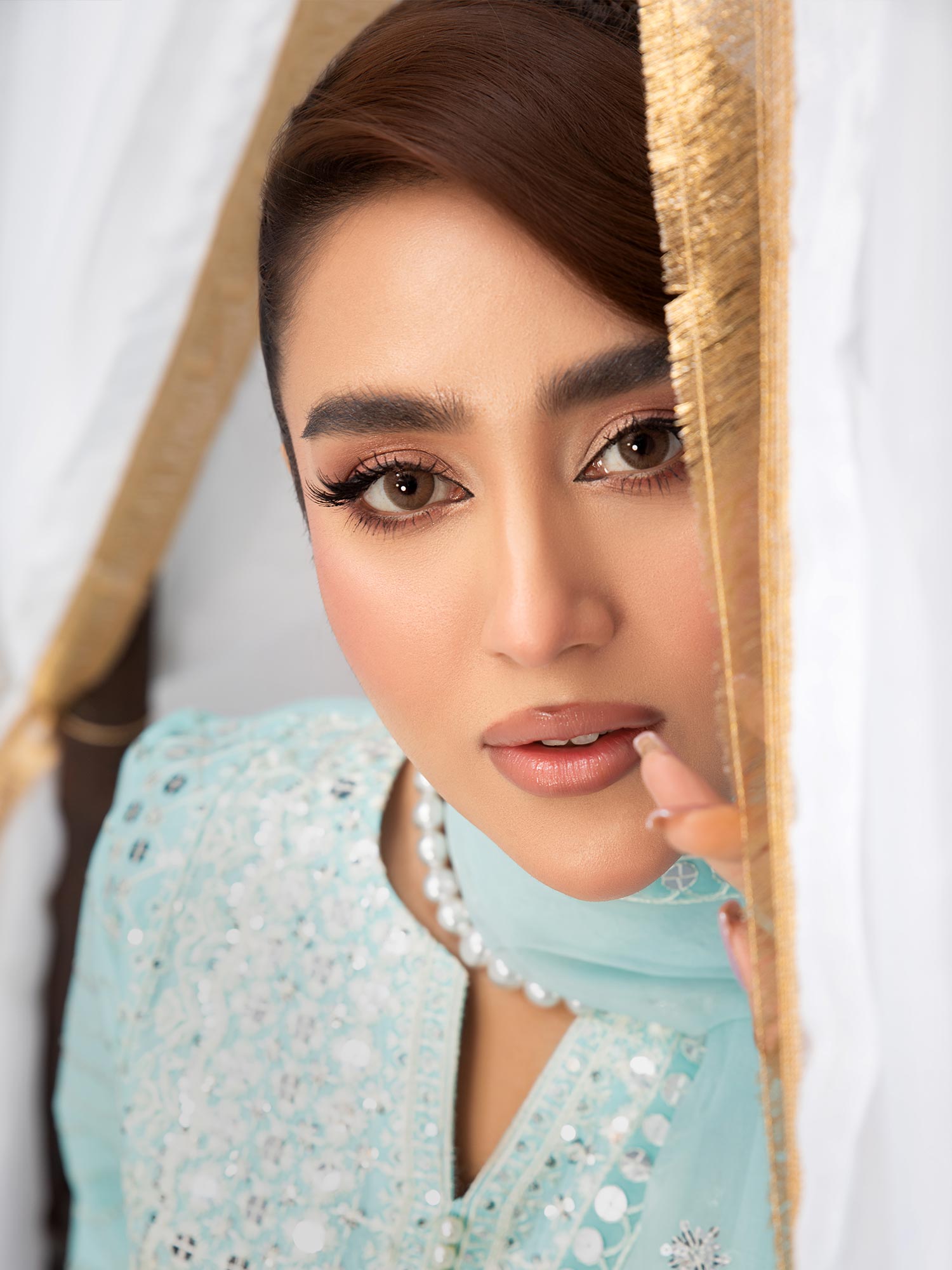 Heera's Aqua Blue Embroidered Cambric Cotton 3-Piece Suit