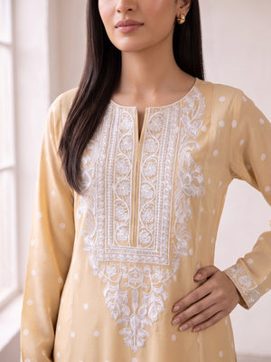 White thread embroidery on cream georgette shirt neckline close-up