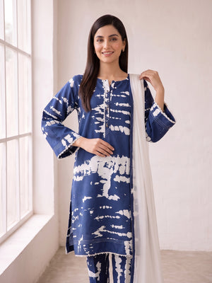 Indigo tie-dye print linen suit showing lace cuffs and hem