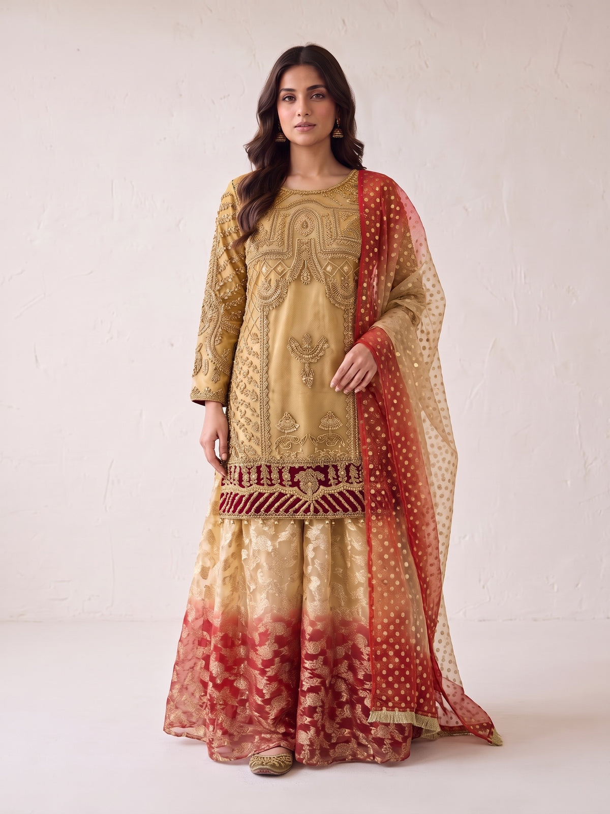 Gold embroidered net suit with sharara and red ombre dupatta - front view