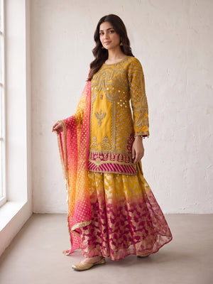 Mustard embroidered net suit with sharara - three-quarter view