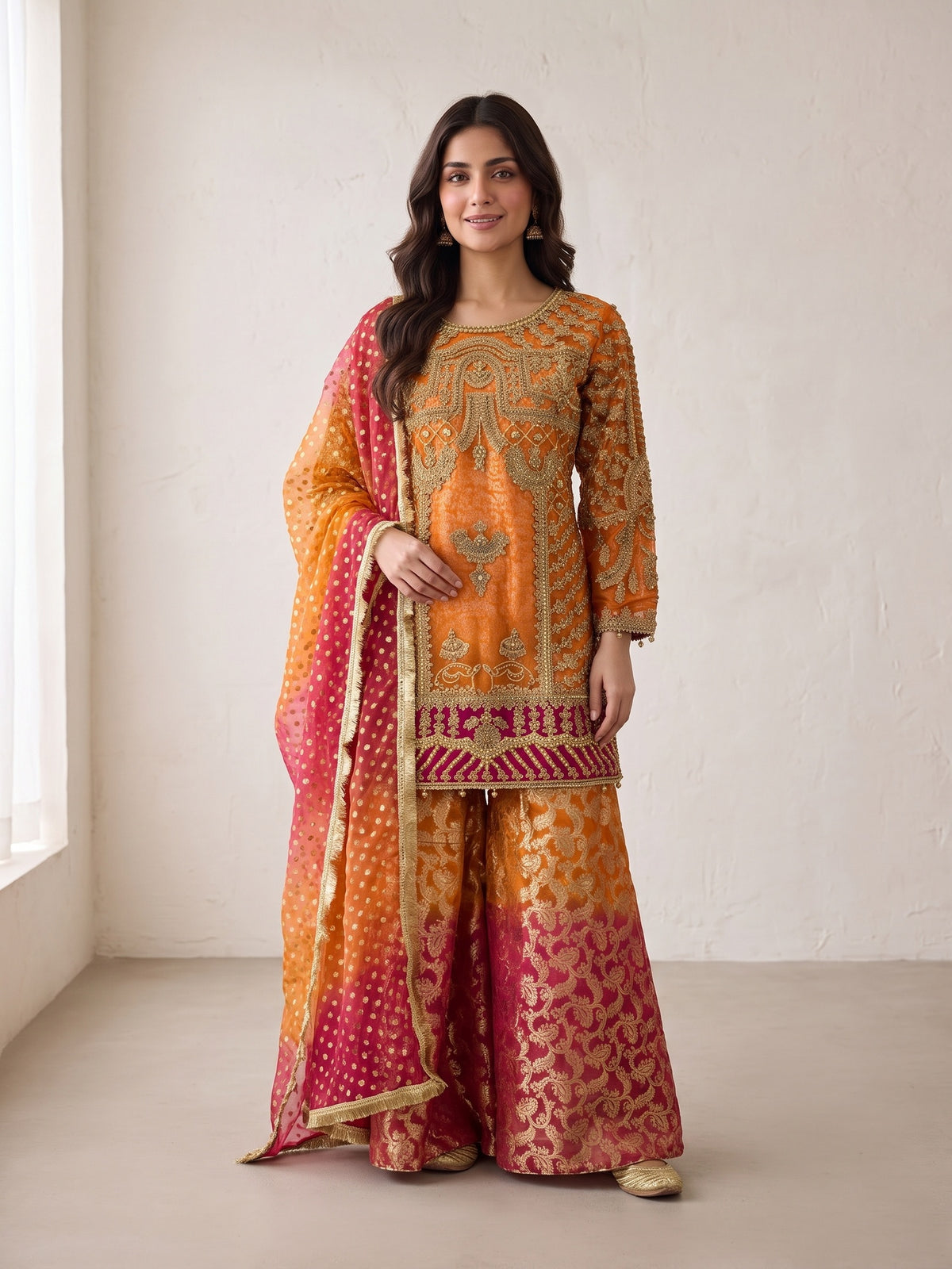 Orange embroidered net suit with sharara and ombre dupatta - front view