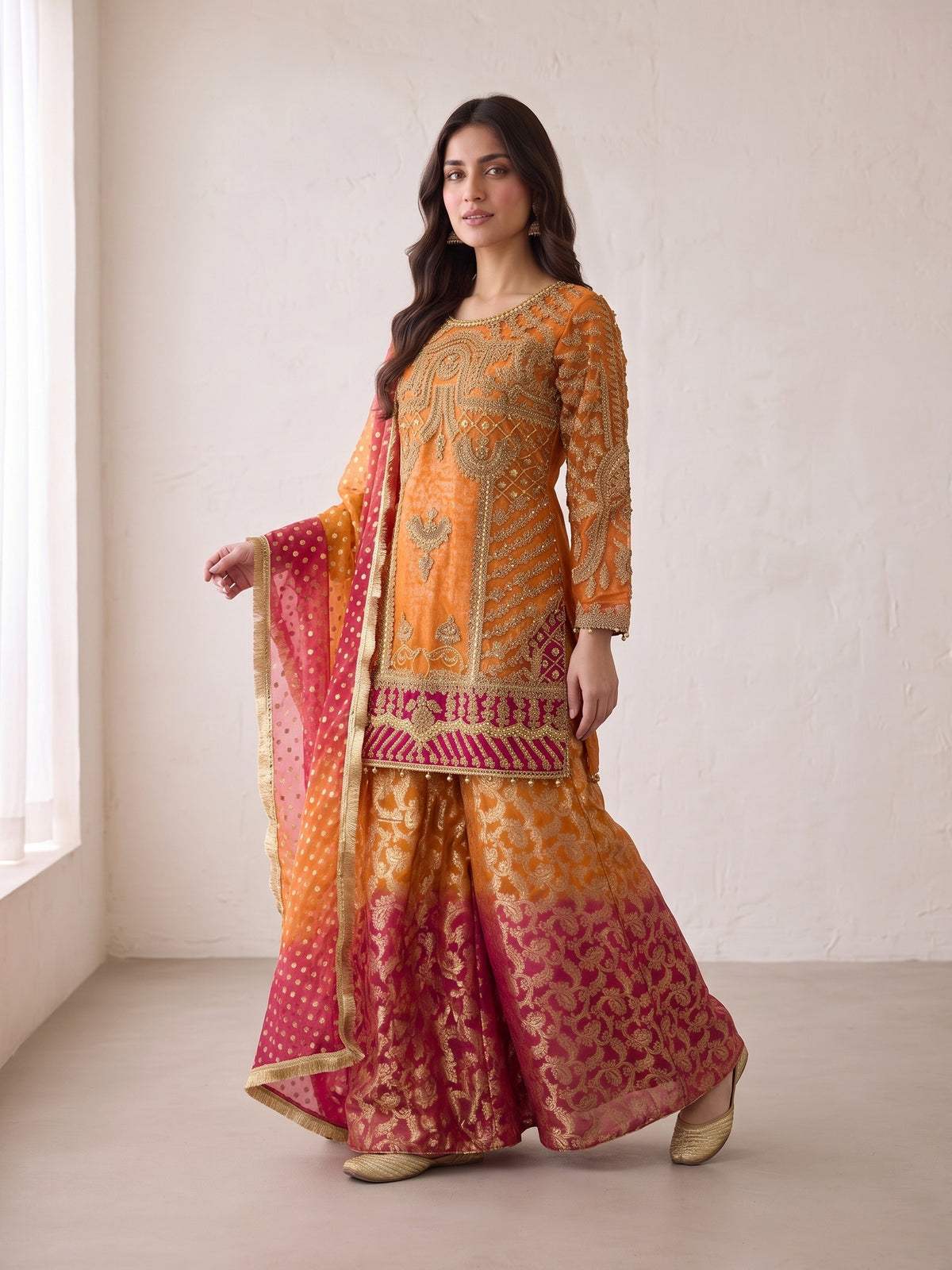 Orange embroidered net suit with sharara - three-quarter view