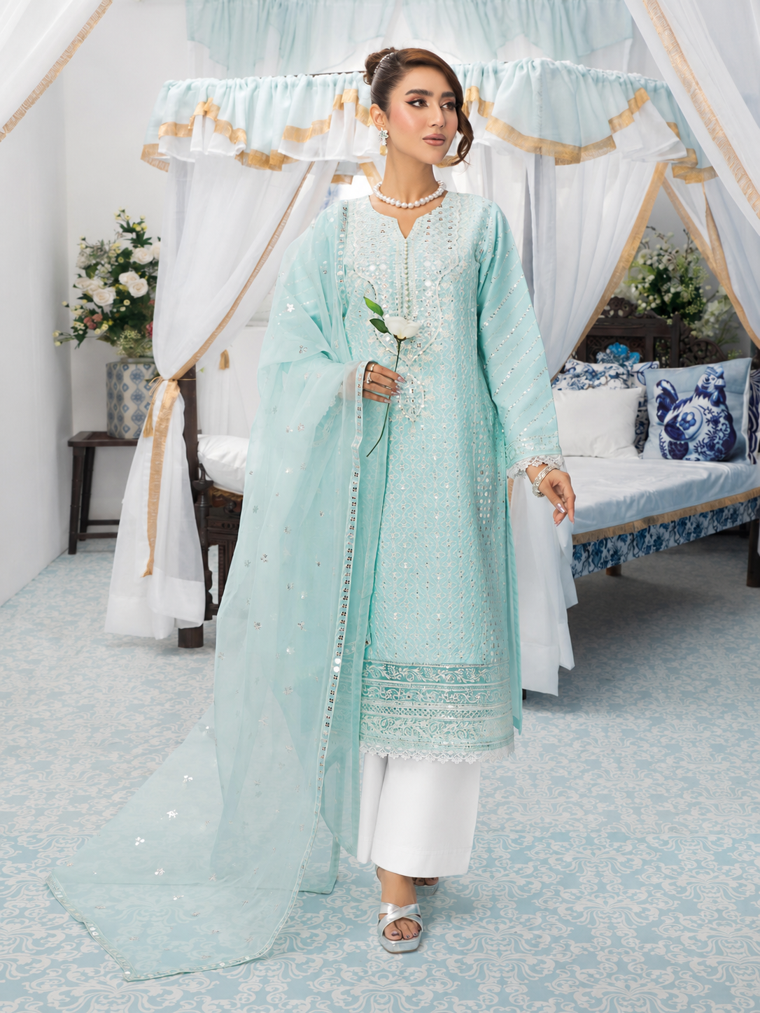 Heera's Aqua Blue Embroidered Cambric Cotton 3-Piece Suit